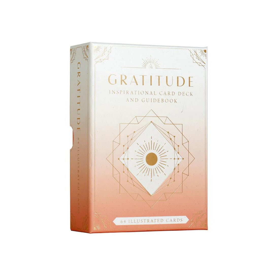 Gratitude inspirerende kortsæt med 64 illustrerede kort og en guidebog præsentert i en elegant pakke med guld- og pastelfarver