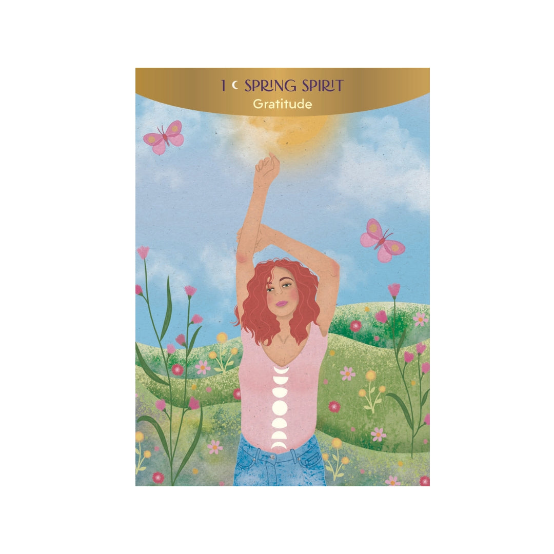 Illustration af en kvinde med krøllet rødt hår, som strækker sine arme op mod solen i et farverigt landskab med blomster og sommerfugle, med teksten 1 c SPRING SPIRIT Gratitude øverst.