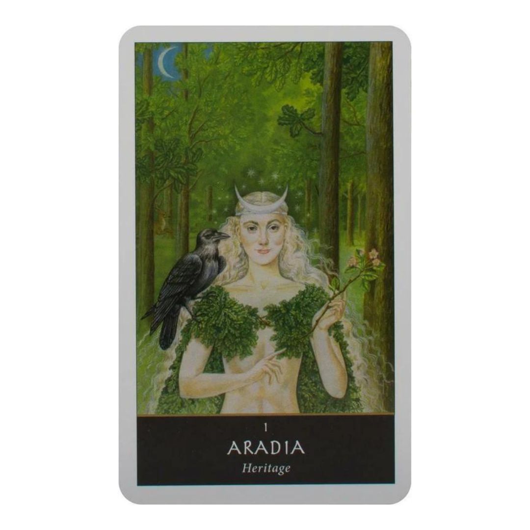 ARADIA orakelkort med en kvinna i skogsmiljö som håller en kvist och har en fågel på axeln
