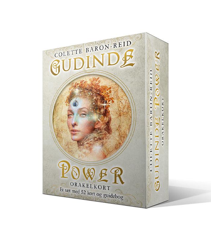Produktbillede af Gudinde Power orakelkort af Colette Baron-Reid med en kunstnerisk fremstilling af en kvinde med gyldent hår og en krystalkugle på panden samt dekorative elementer i baggrunden pakket i en elegant æske med tekst og design i gyldne nuancer